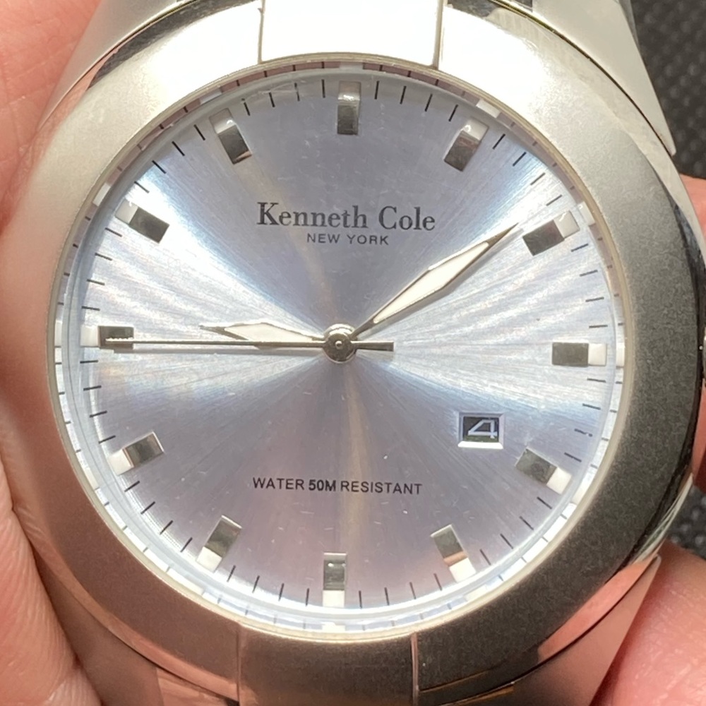Kenneth Cole reaction men’s silver date watch 41 mm 100% guaranteed working.